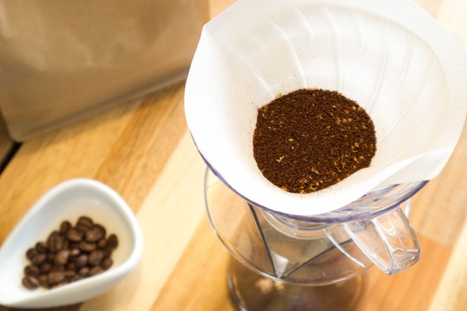 Coffee filter paper being prepared for brewing